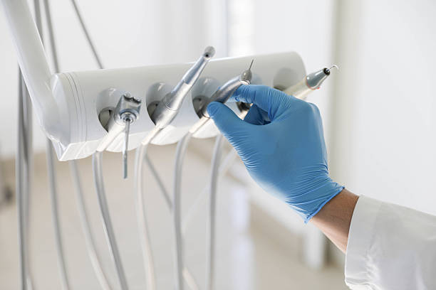 Professional Root Canal Treatment technician working in East Hampton North, NY
